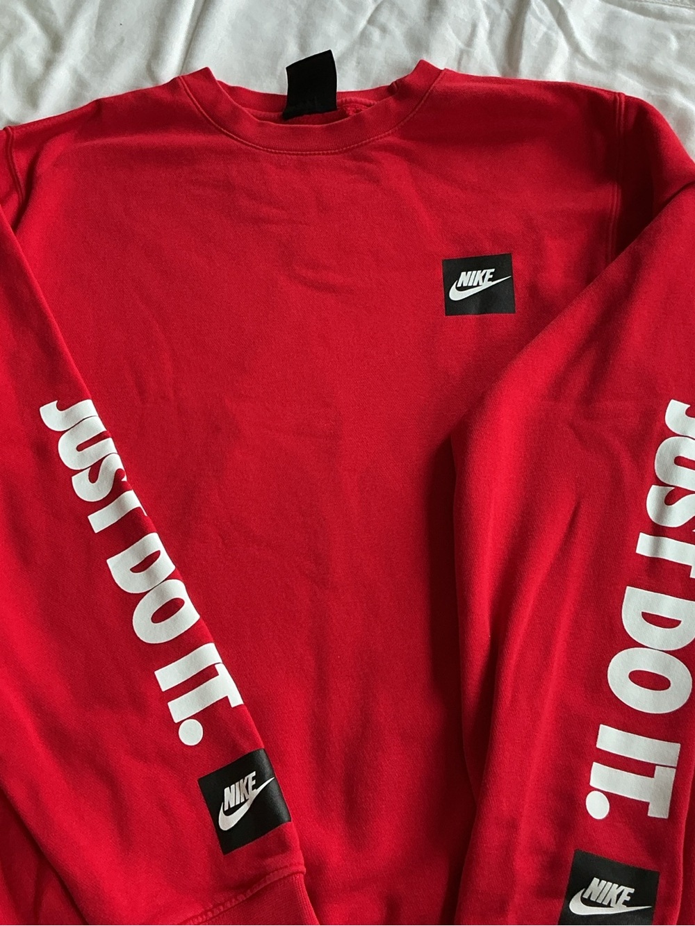 Nike Red Long-Sleeve Crewneck with White 'Just Do It.' Sleeve Graphics